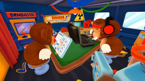 BOMBANANA! screenshot of two cartoon monkeys at a table with a laptop, tablet, and arcade machine in a colorful room.