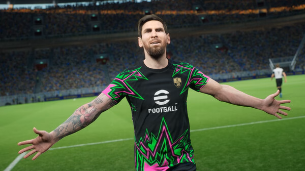 A player in a colorful jersey celebrates on the field in this eFootball™ game screenshot, with a stadium full of cheering fans.