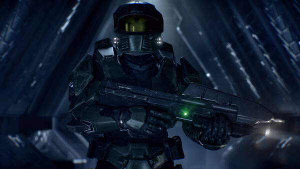 Halo: Campaign Evolved screenshot showing a Spartan soldier in green armor holding a weapon in a futuristic, metallic hallway.