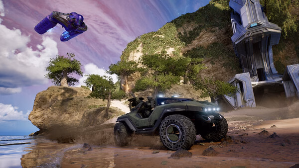Halo: Campaign Evolved screenshot featuring a Warthog vehicle on a beach, with a purple alien ship hovering above.