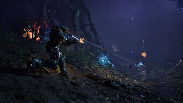 Halo: Campaign Evolved screenshot featuring a soldier firing at alien creatures in a dark, forested environment.