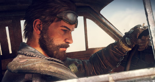 Mad Max screenshot: A rugged driver grips the steering wheel of a weathered car, looking intensely ahead through the window.