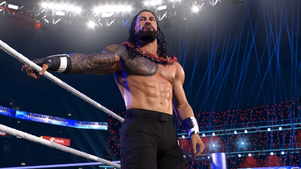 Screenshot from WWE 2K26 showing a muscular wrestler in the ring, adorned with tattoos, under bright stadium lights.