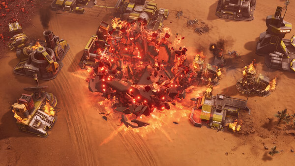 A Tempest Rising screenshot showing a fiery explosion destroying buildings in a desert-themed battlefield environment.