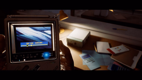 Screenshot from SILENT HILL: Townfall showing a handheld device displaying "FINE TUNE - SEARCHING" on a cluttered desk.