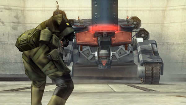 A screenshot from METAL GEAR SOLID: MASTER COLLECTION Vol.2 showing a character facing off against a large mech in a concrete area.